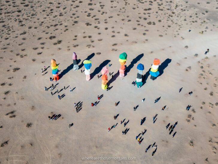 Seven Magic Mountains art exhibit near Las Vegas Nevada photo taken from drone aerial photography angled to capture crowds colorful boulders and shadows