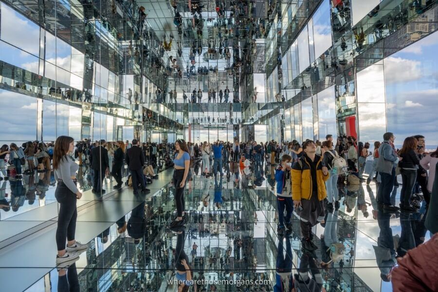 Transcendence I with many people posing to take photographs
