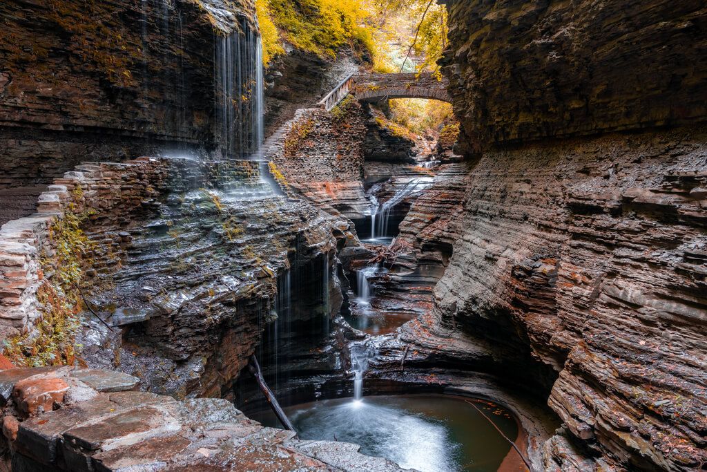 Watkins Glen State Park during the fall with water flowing in the gorge