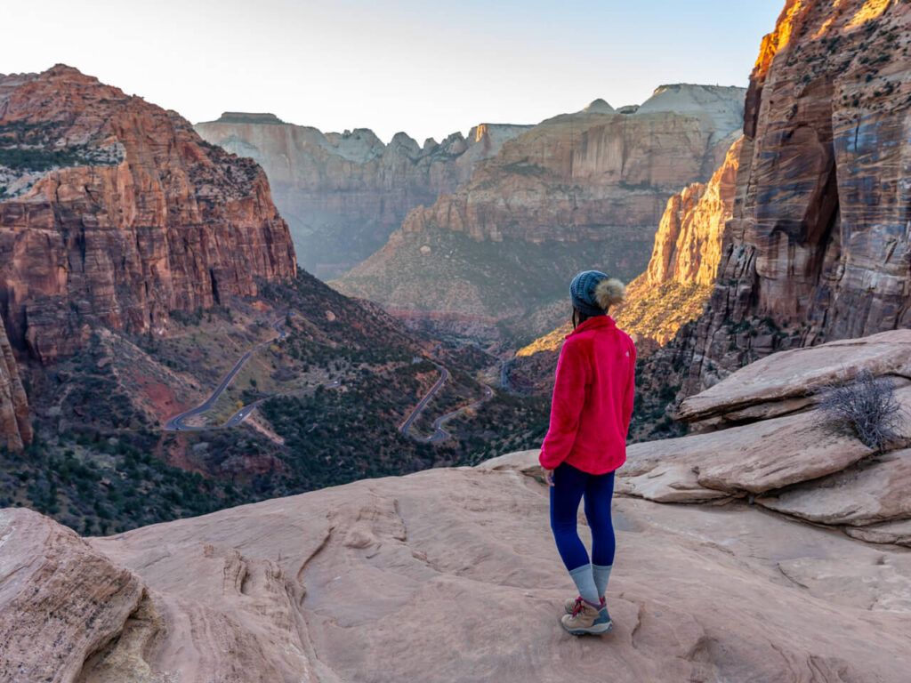 Woman looking out at Zion Canyon in Utah