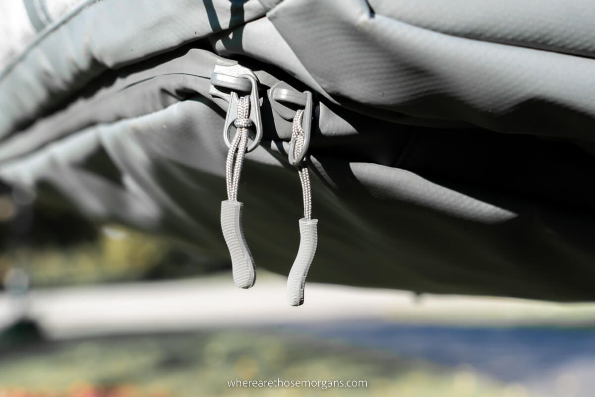 Close up view of the exterior zippers on the Monarc Settra duffel backpack
