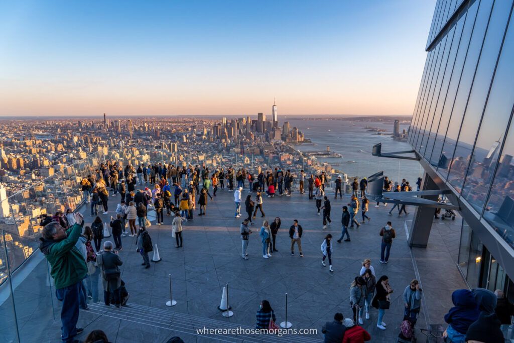 Visitors taking photos at Edge observation deck in New York City