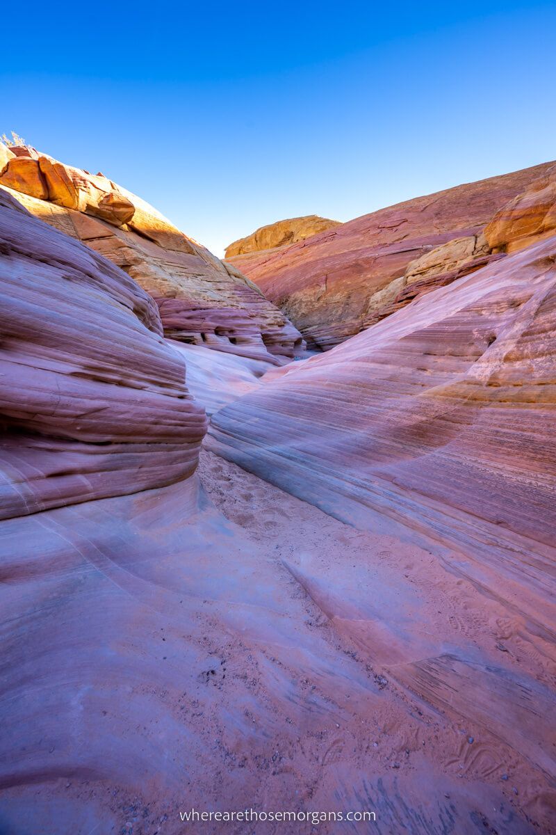 Pink Canyon swirling patterns in Valley of Fire Nevada on a sunny day with blue sky