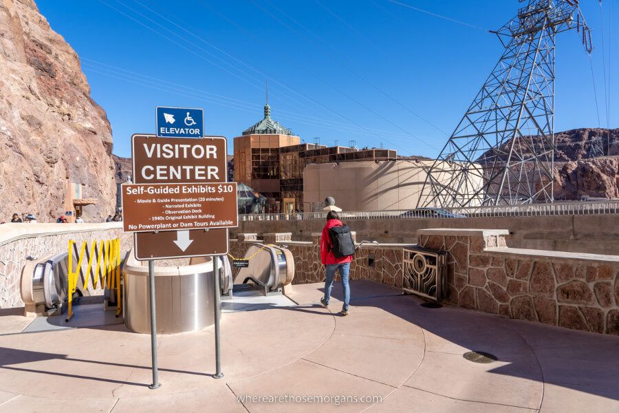 Woman going down to a visitor center to look at tour options