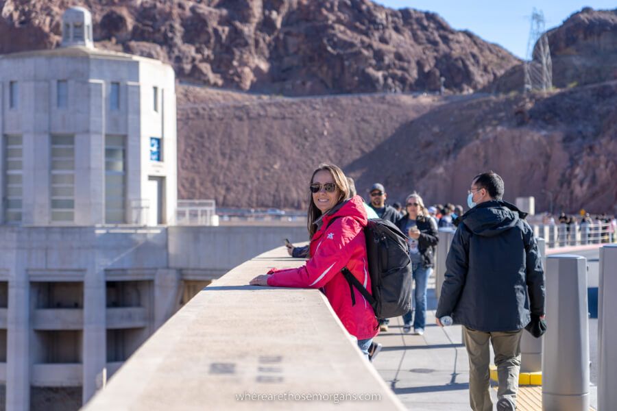 Woman crossing concrete structure into Arizona