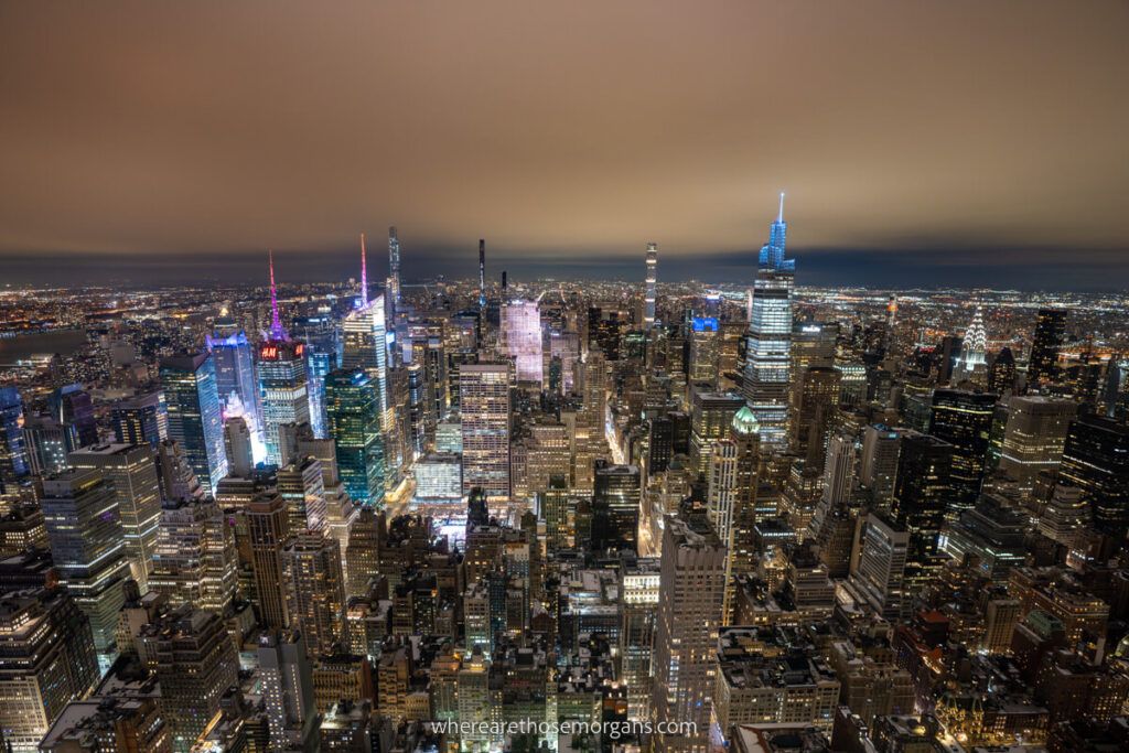 Manhattan skyline view at night from a NYC observation deck