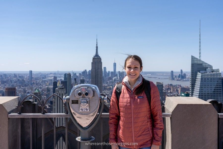 Woman with viewfinder and Empire State Building in background