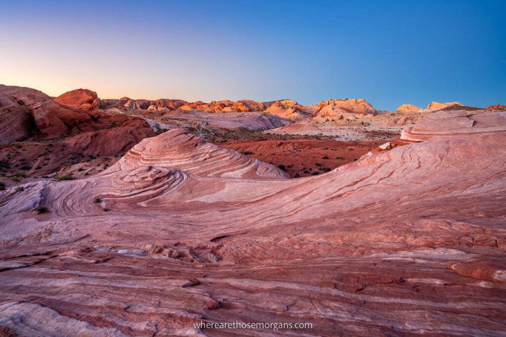 Stunning sunrise with red colors swirling at the Fire Wave in Valley of Fire State Park near Las Vegas Nevada