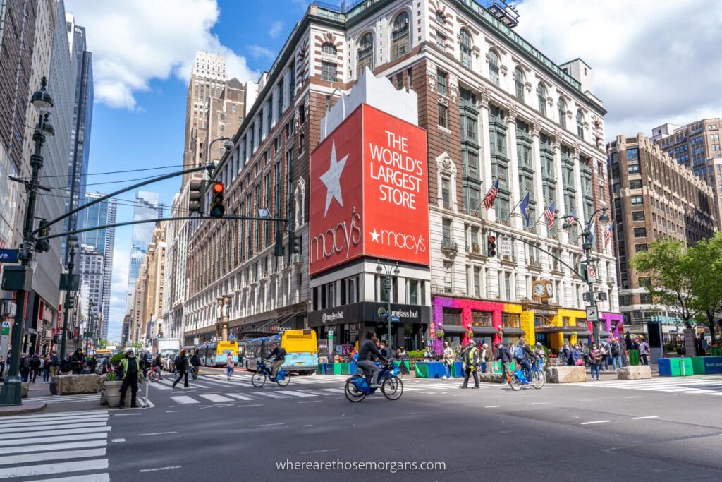 Macy's store with people cycling and crossing the road