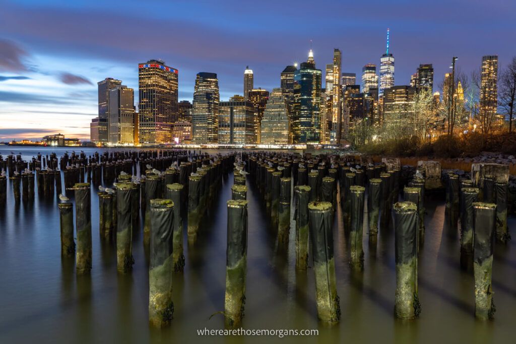 New York City skyline from Pier 1 at night buildings lit up with office lights