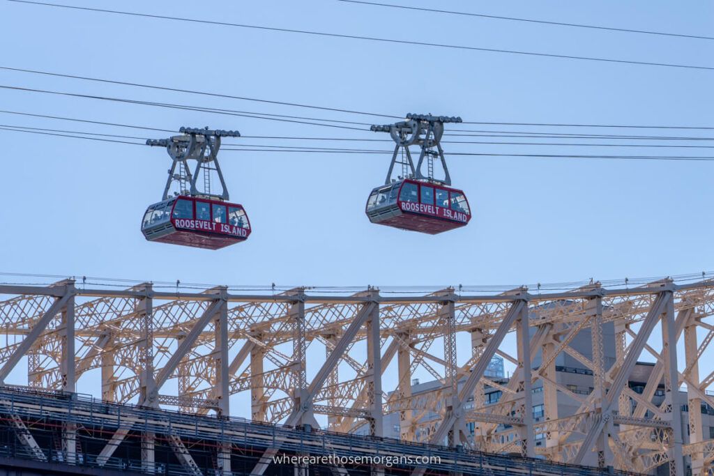 Roosevelt Island Tramway cable cars heading over the East River in nyc