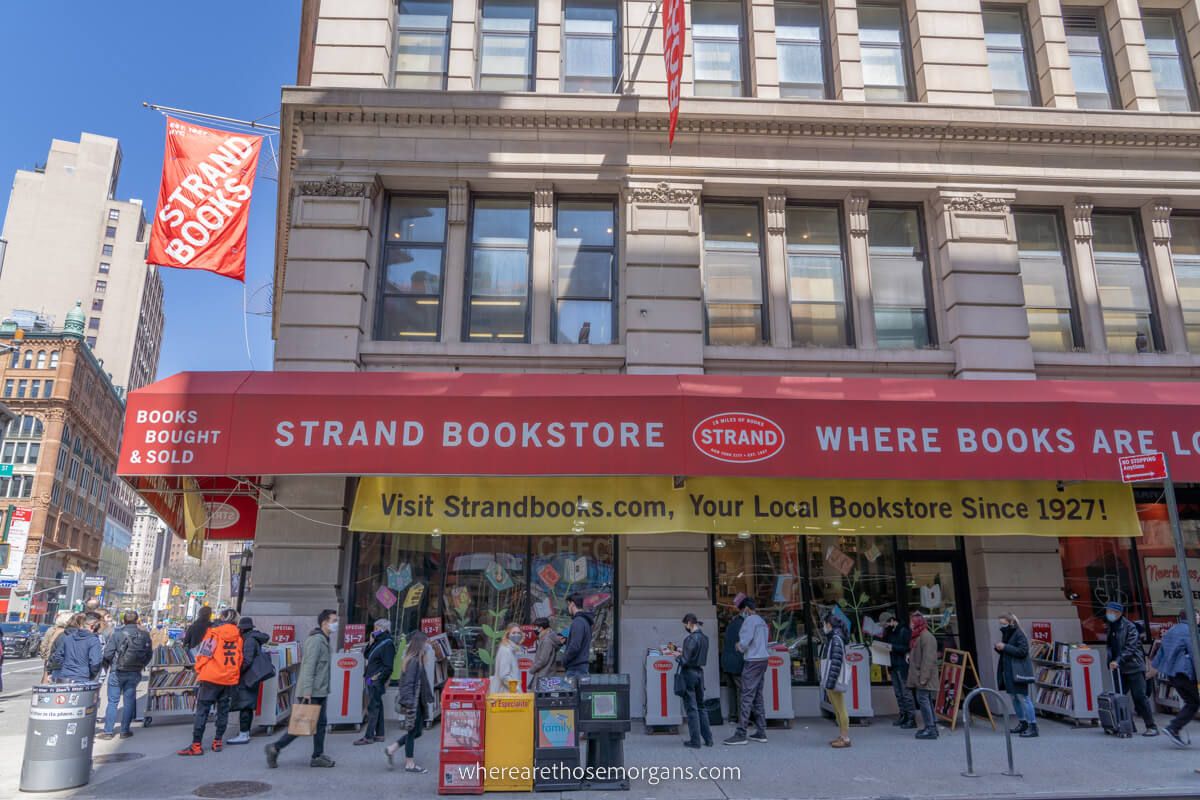 Strand bookstore red banner and flag with huge line waiting