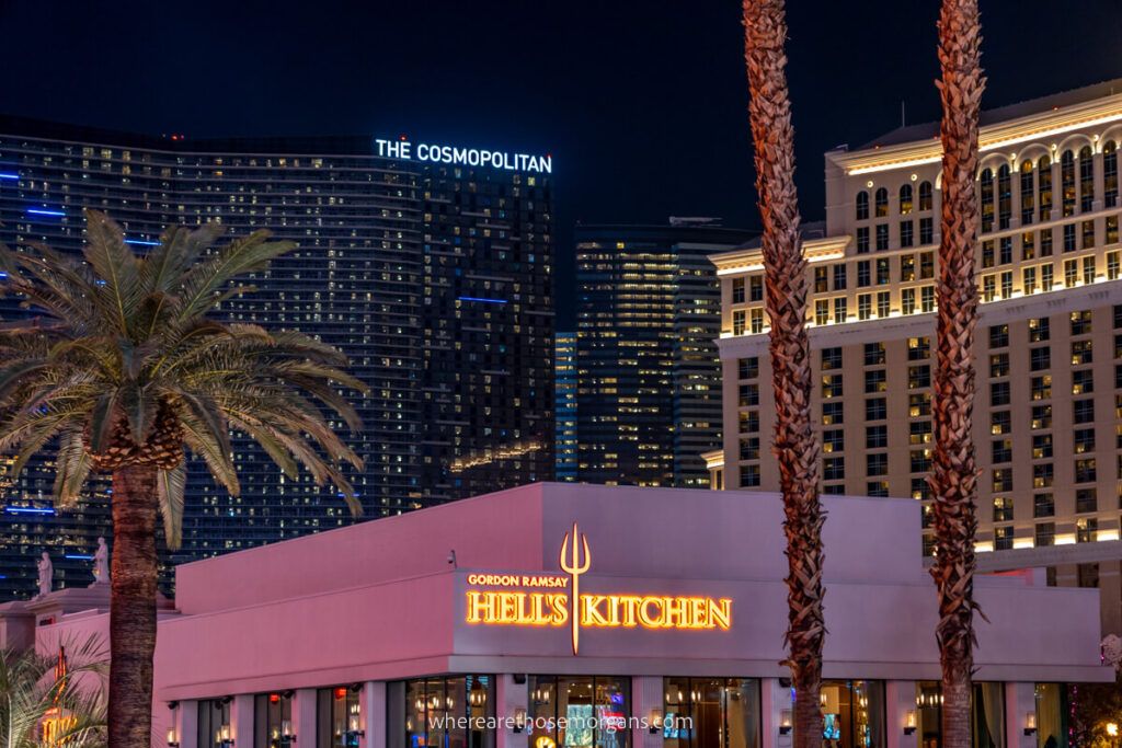 Hells Kitchen by Gordon Ramsay with Cosmopolitan Hotel behind at night