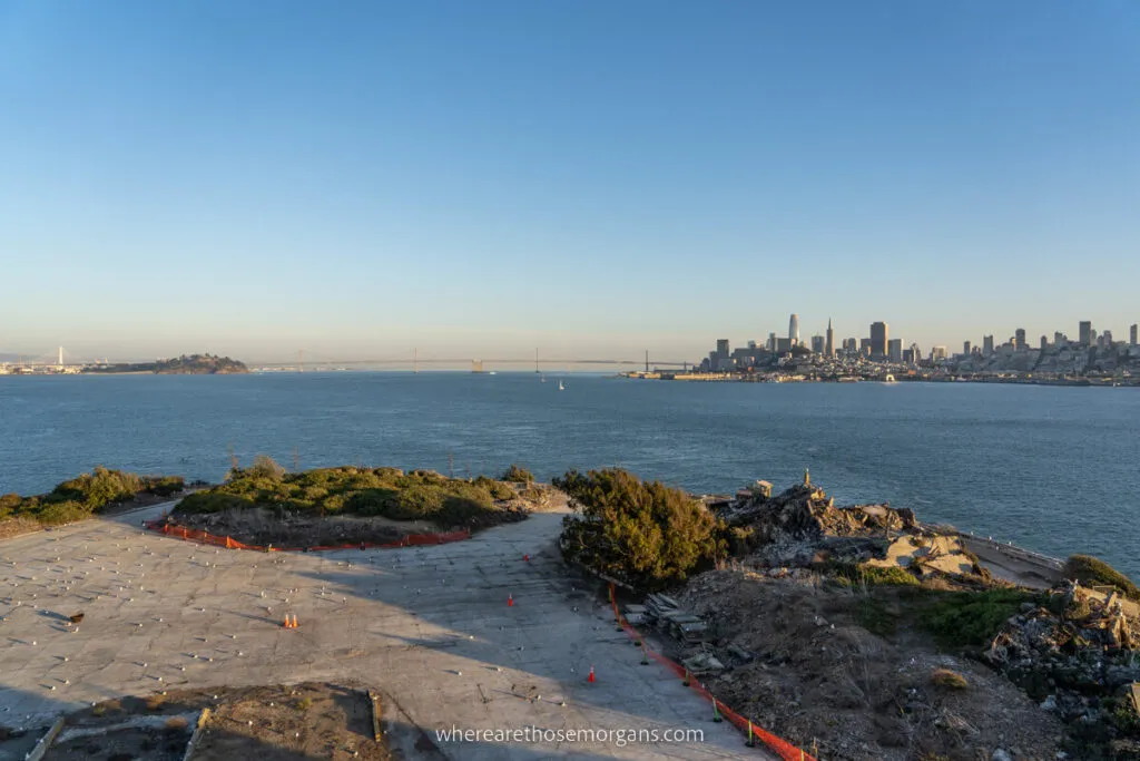 Ruins of old buildings on Alcatraz island with San Francsico in the background