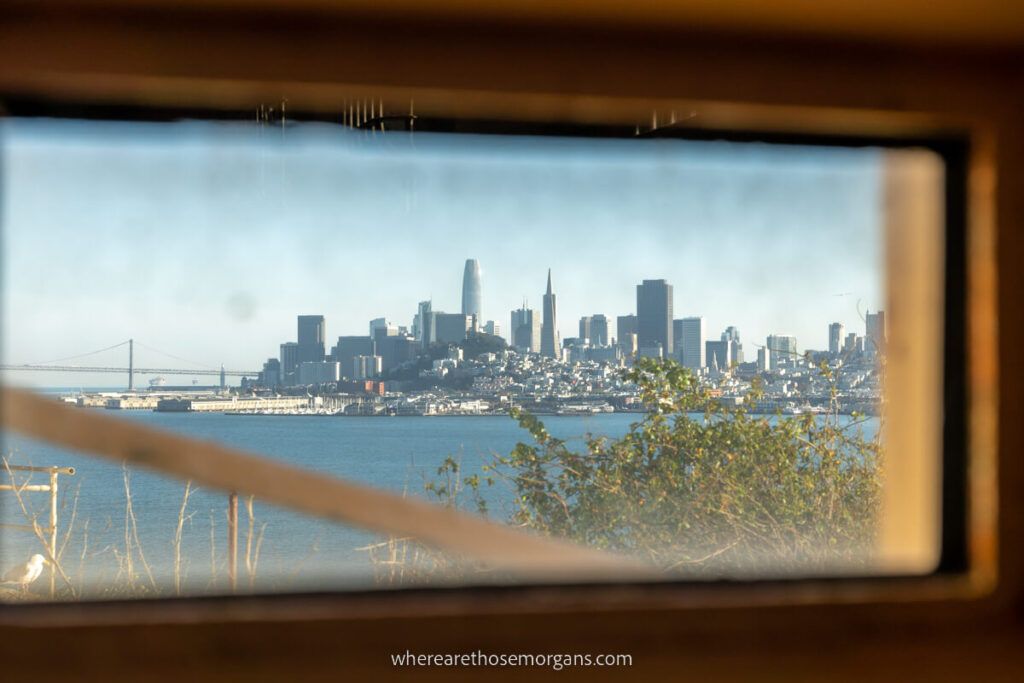 Perspective photo of San Francisco through a window in the Alcatraz prison