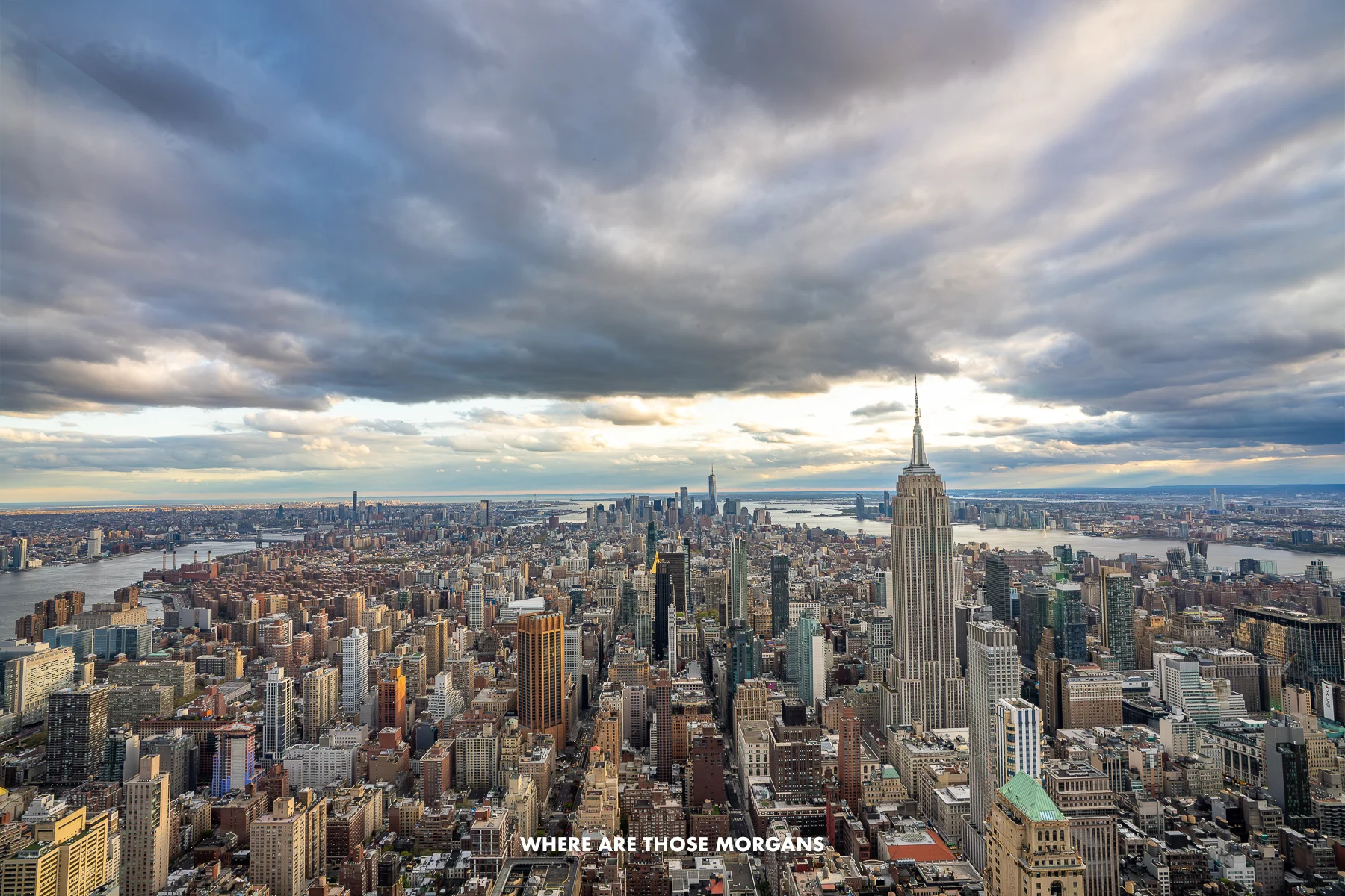 Wide open elevated view of the New York City skyline with heavy thick clouds in the sky