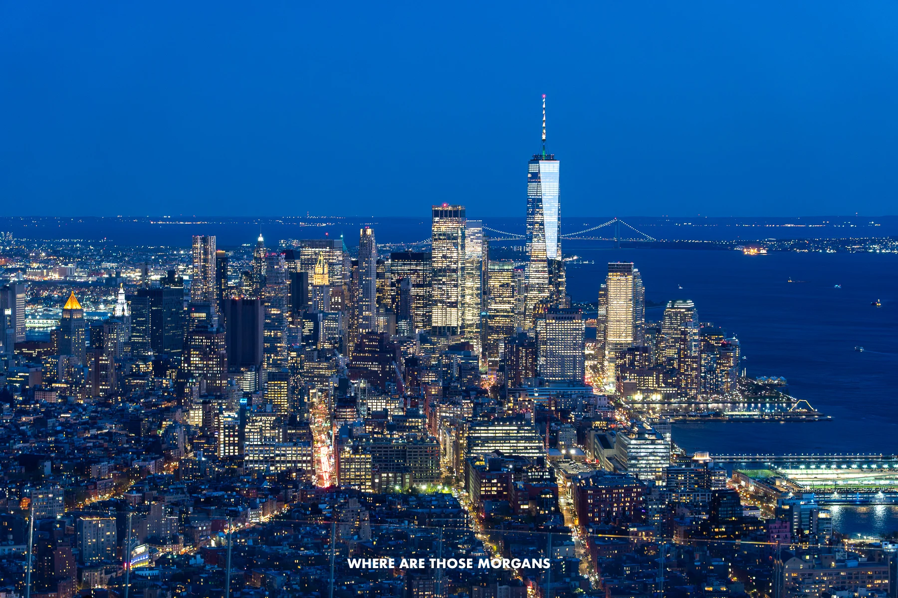 Lower Manhattan skyline lit up at night from Edge NYC observation deck