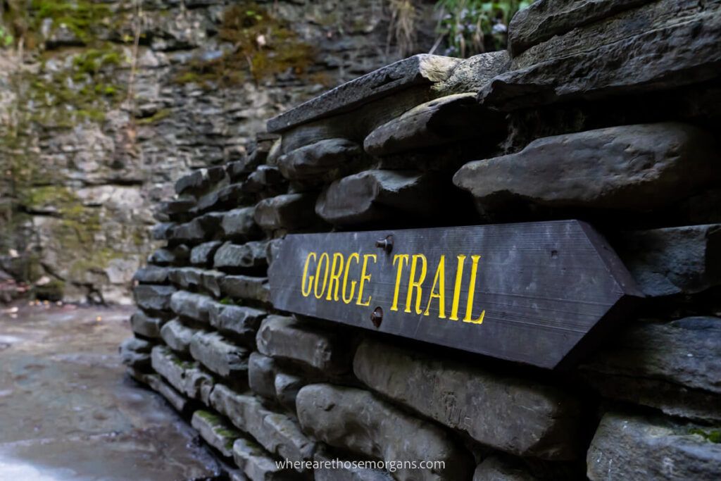 Gorge Trail sign on rocks with yellow letters