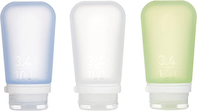 Blue, clear and green travel sized silicone bottles for creams
