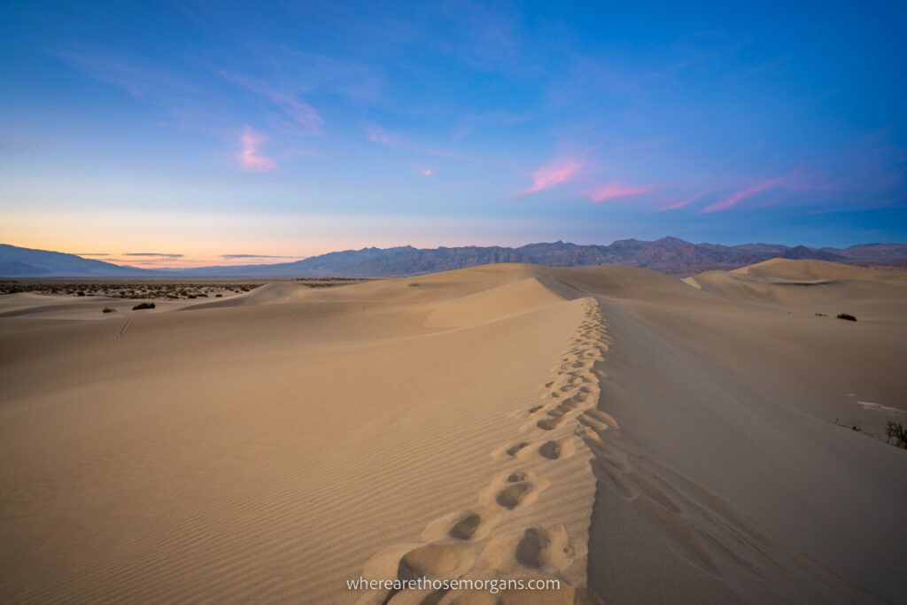 Footprints on top of sand dunes at Mesquite Flats in Death Valley National Park