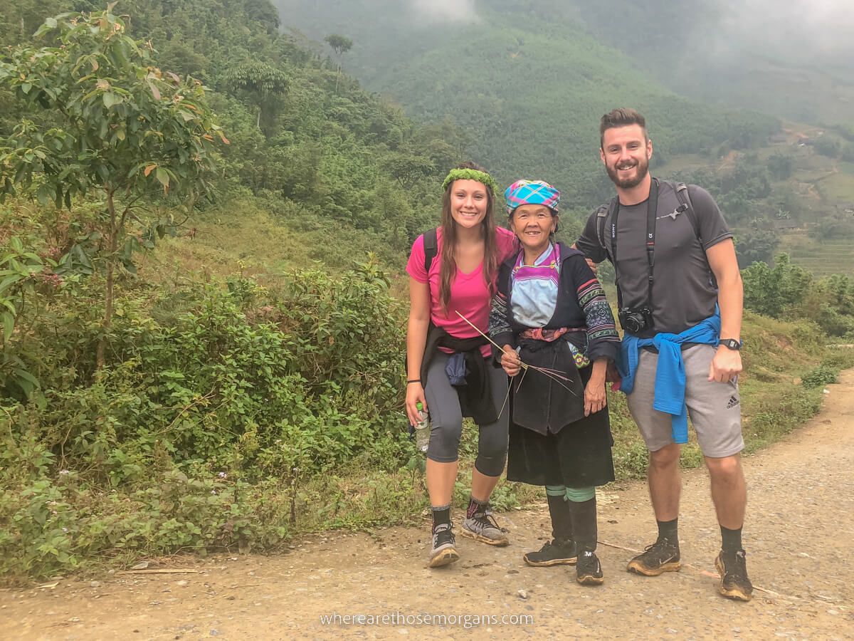Men and two women trekking through Sapa in northern Vietnam