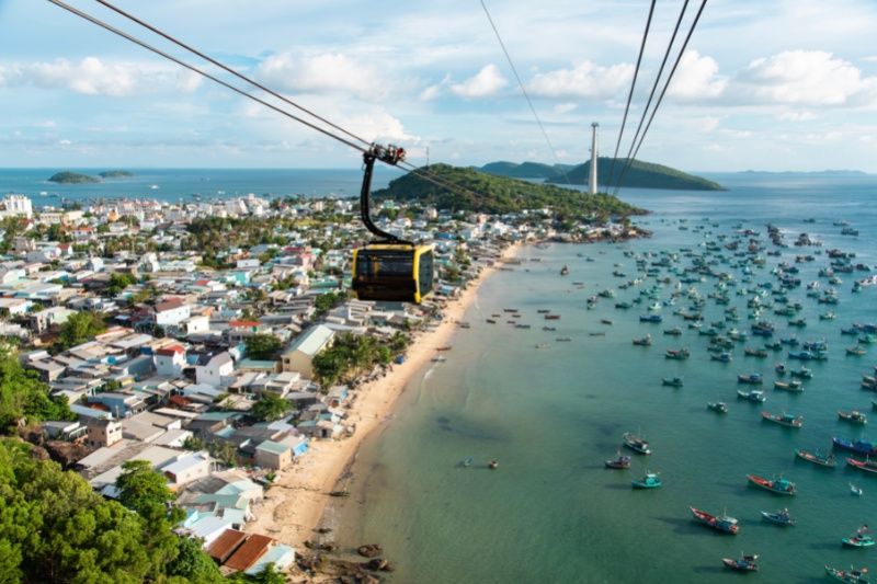 Yellow cable car stretching over the beach in Phu Quoc one of the best places to visit in Vietnam