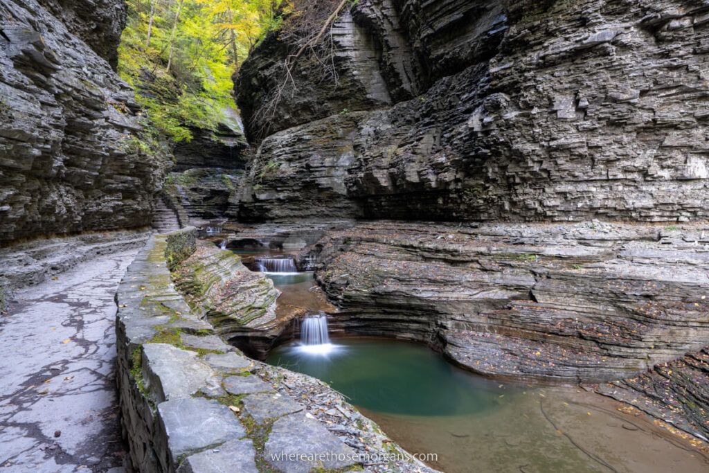 Small waterfalls and plunge pools inside a dramatic ravine in new york
