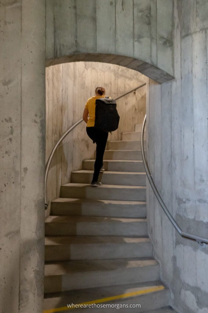 Woman climbing the 250 stairs to the top of Coit Tower