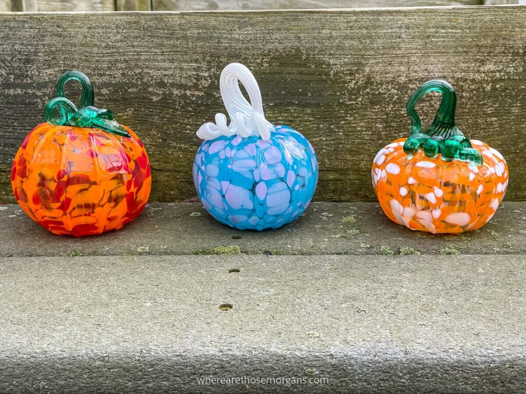 Three colorful pumpkins from the corning museum of glass