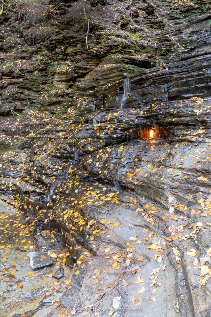 Side profile of flickering flame at a waterfall in upstate New York