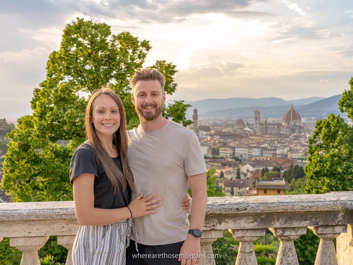Mark Morgan and Kristen Morgan at a viewpoint overlooking Florence at sunset