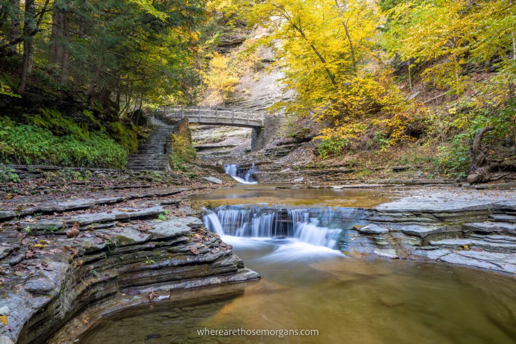 Wooden bridge and small waterfall at Stony Brook