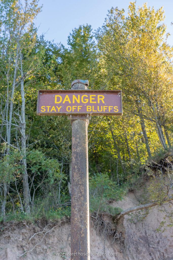 Brown danger sign at Chimney Bluffs State Park