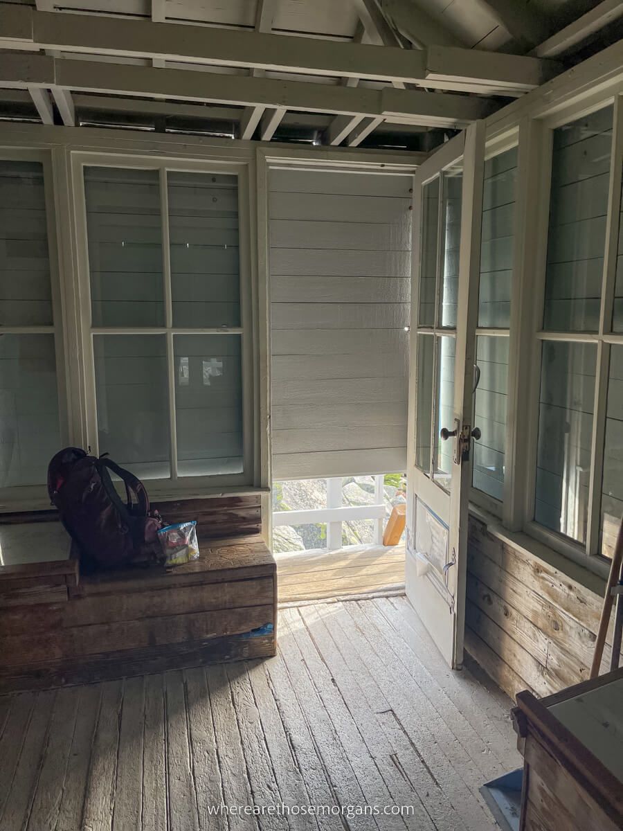 Small and low down entrance to access a wooden fire tower