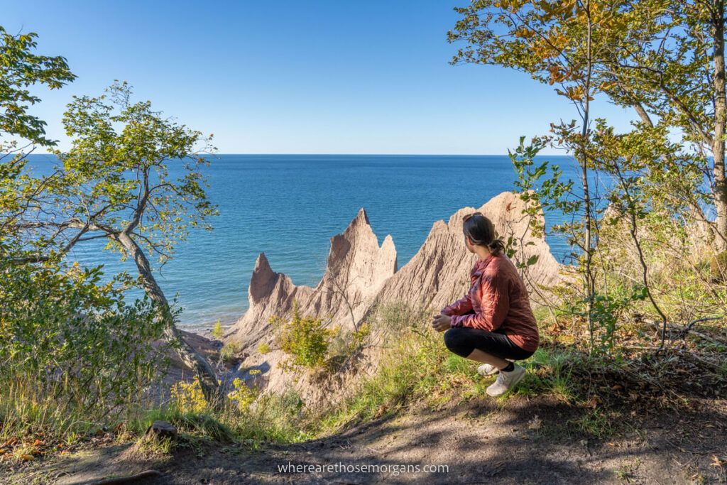 Women taking in the views of large sand Chimney Bluffs