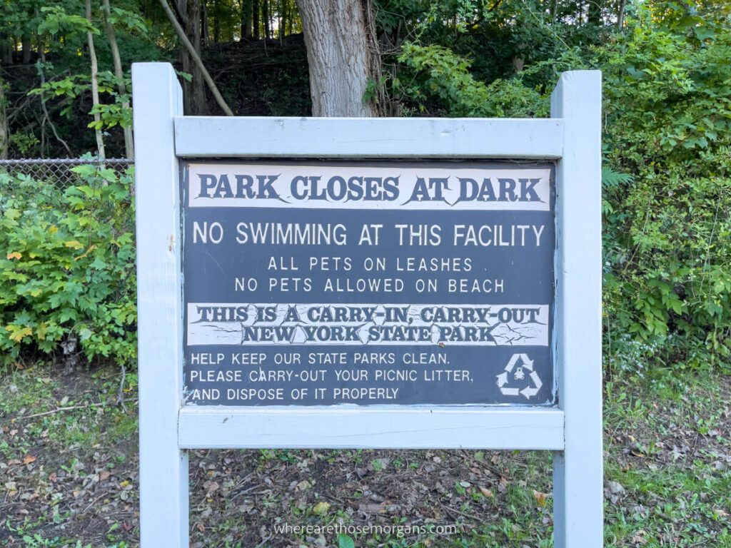 White information sign at Chimney Bluffs State Park