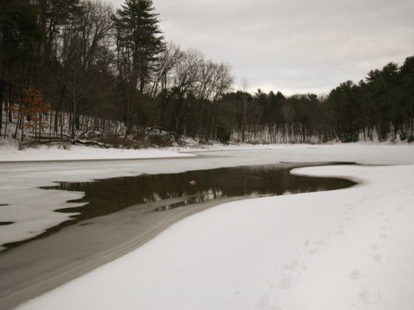 Moreau Lake State Park frozen over in the winter season with lots of snow