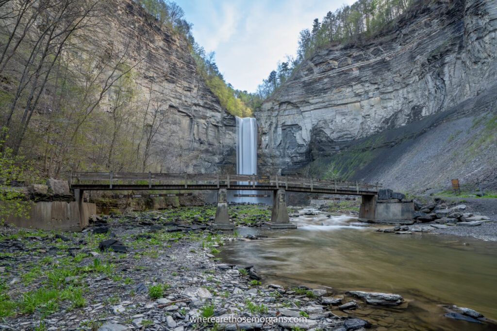 Wooden bridge and Taughannock Falls view in a NY State Park