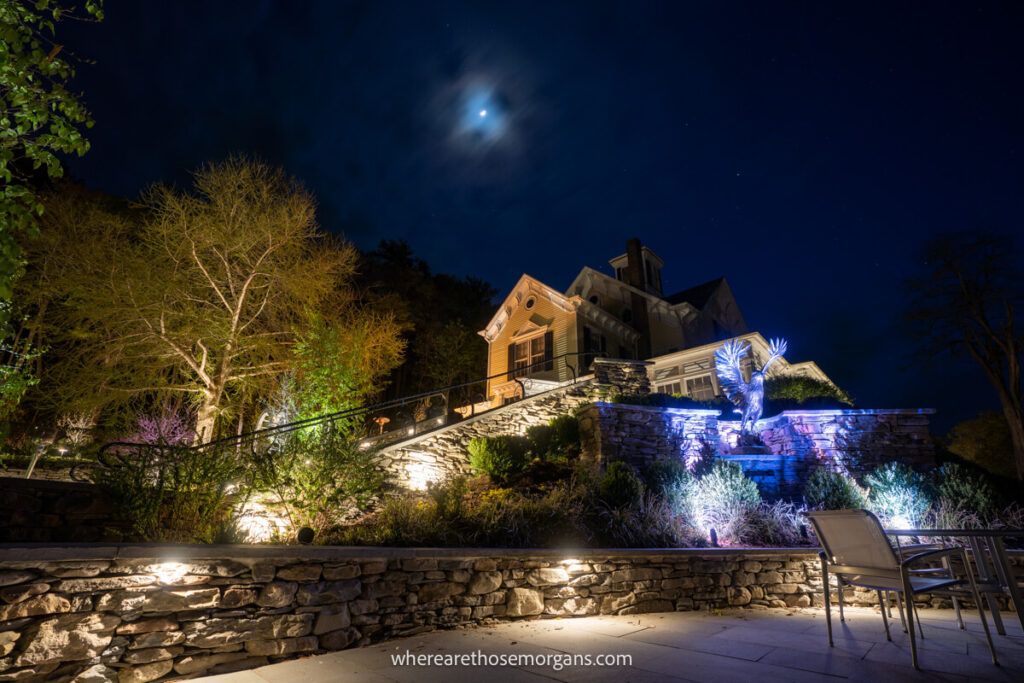 Night view with moon in the distance of the Inn at Taughannock