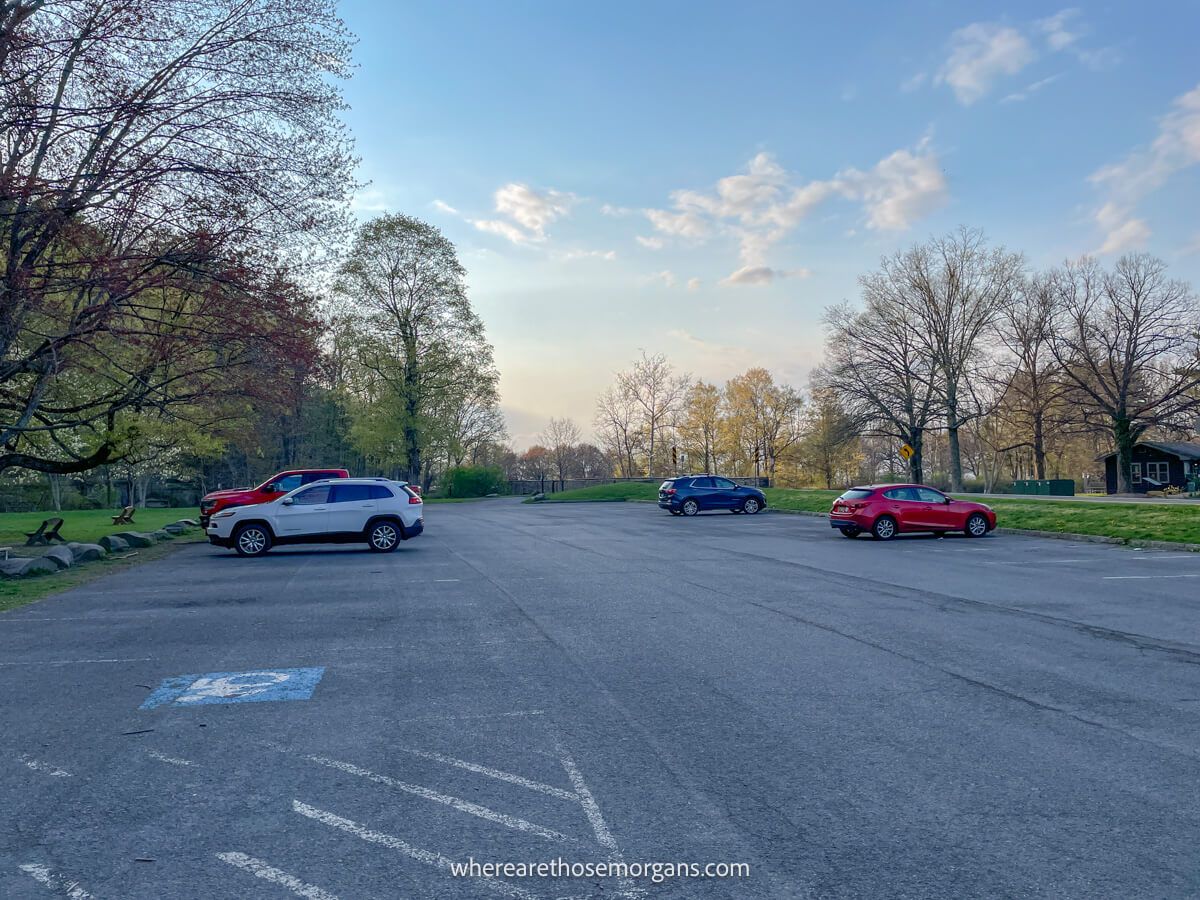 Empty parking lot with a few cars near the popular Gorge Trail