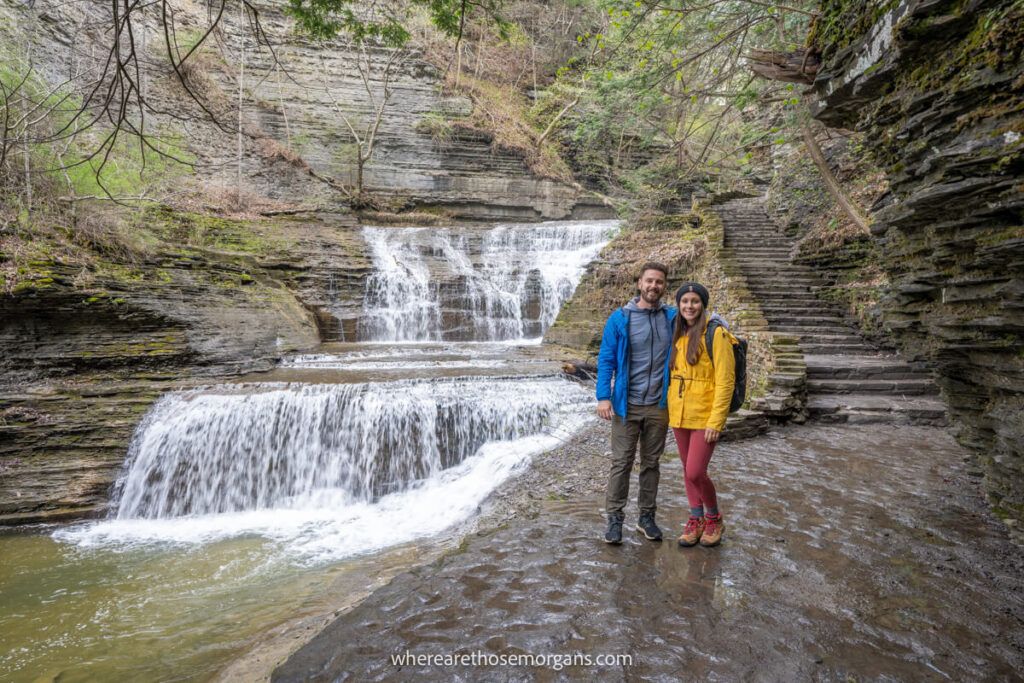 People posing for a photo along the Gorge trail at Buttermilk Falls State Park