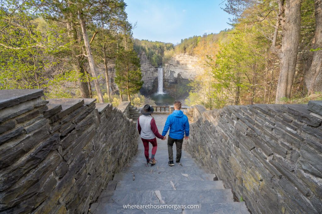 Two people holding hands at Taughannock Falls Overlook