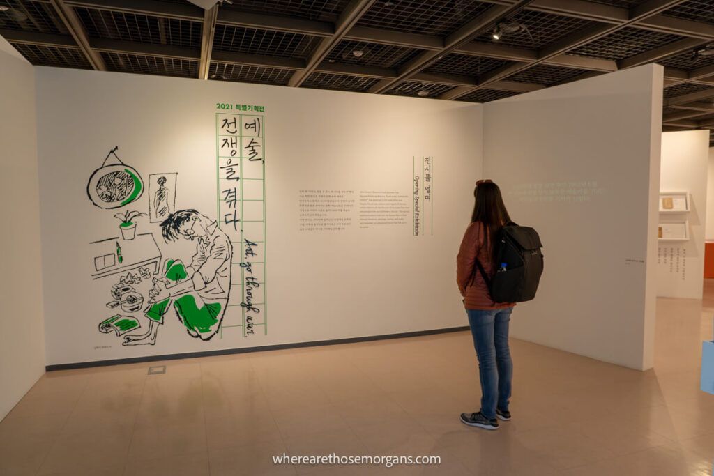 Woman reading an exhibit in the National Memorial for Abductees during the Korean War