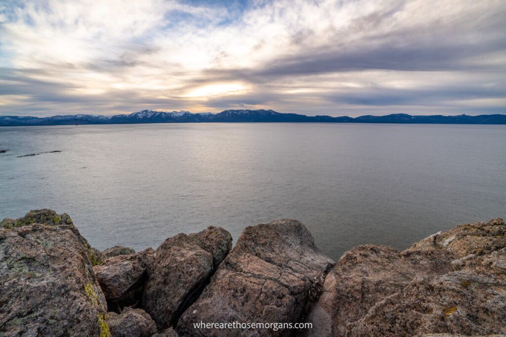 Lake Tahoe in the evening from a rocky viewpoint at the end of Cave Rock Trail