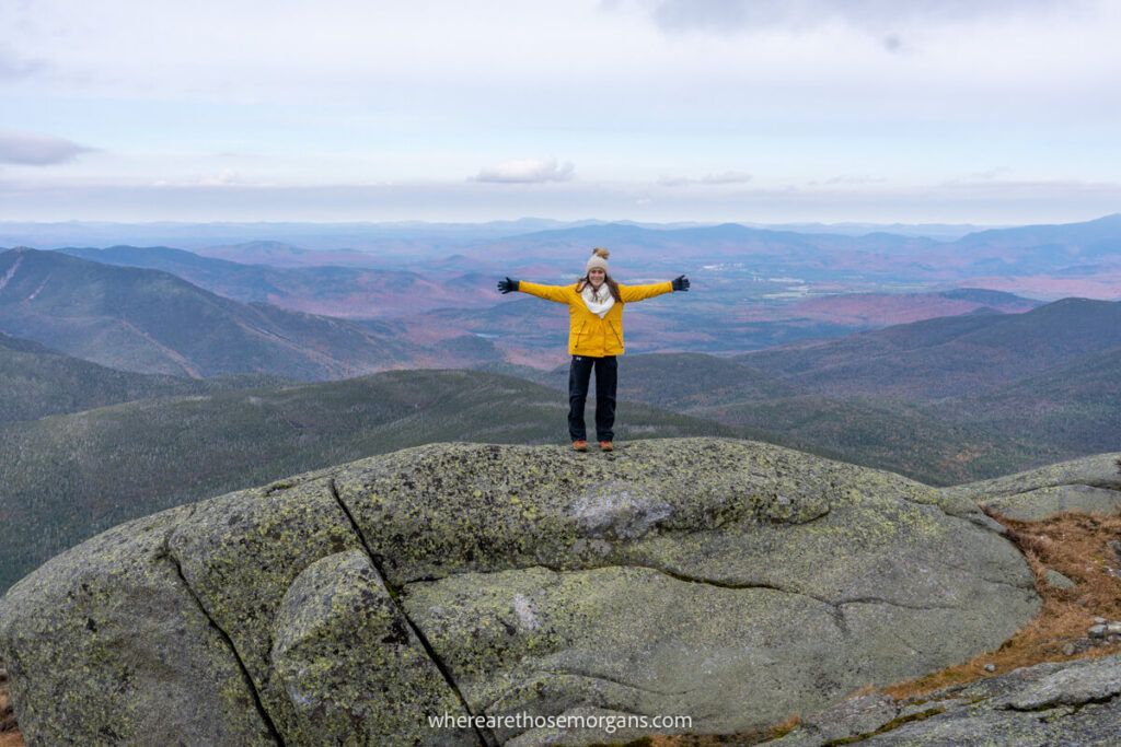 Woman on top of Mount Marcy in New York State
