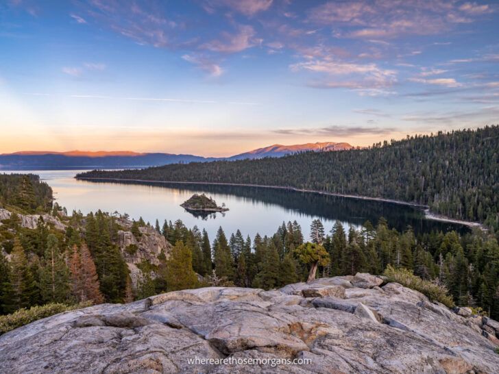Emerald Bay at dawn rocks trees lake and clouds one of the best sunrise and sunset photo spots in Lake Tahoe