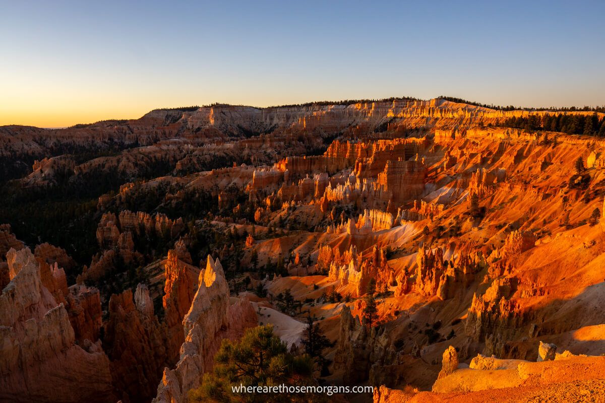 Bryce Canyon amphitheater at sunrise burning red stunning photo spot on a zion to bryce canyon road trip