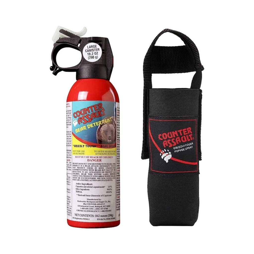 A canister and holder of counter assault bear spray for hikers