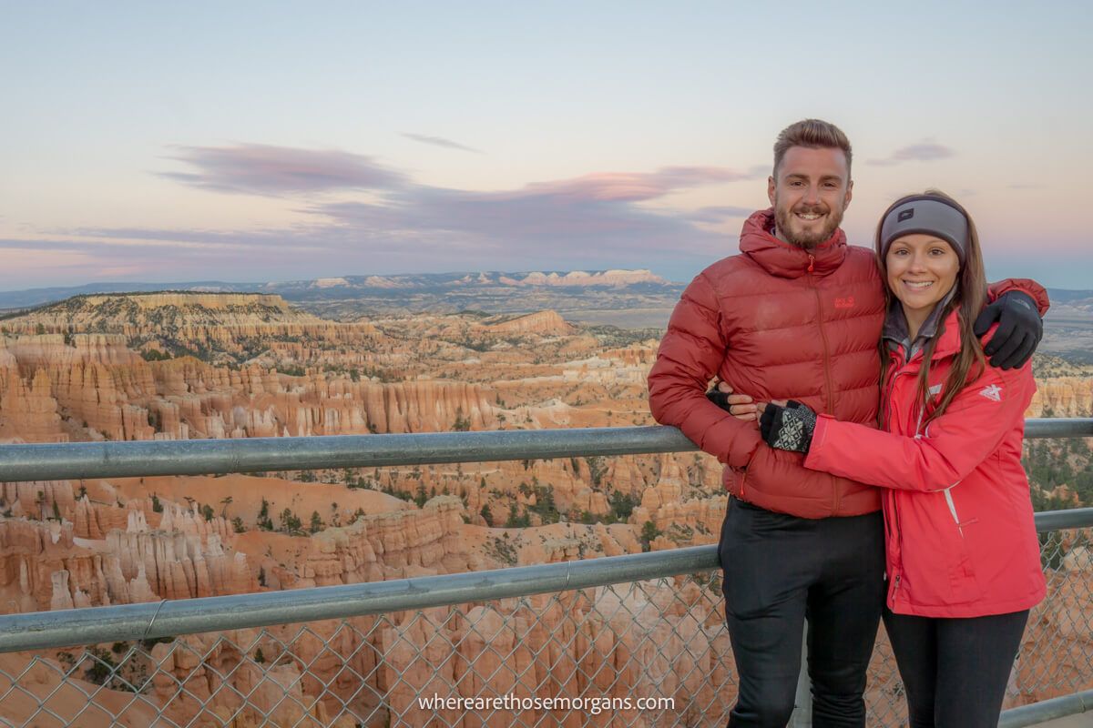 Couple hugging on a cold day in Bryce Canyon national park after sunset