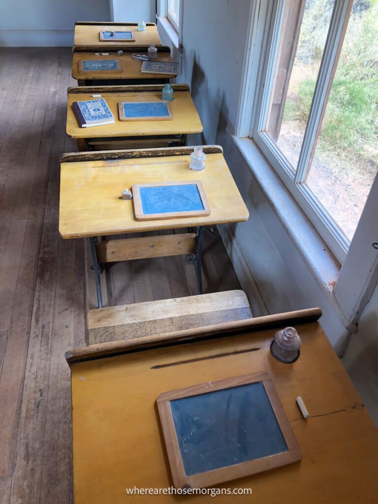 Four desks in a row in the Fruita schoolhouse makes a great photo location
